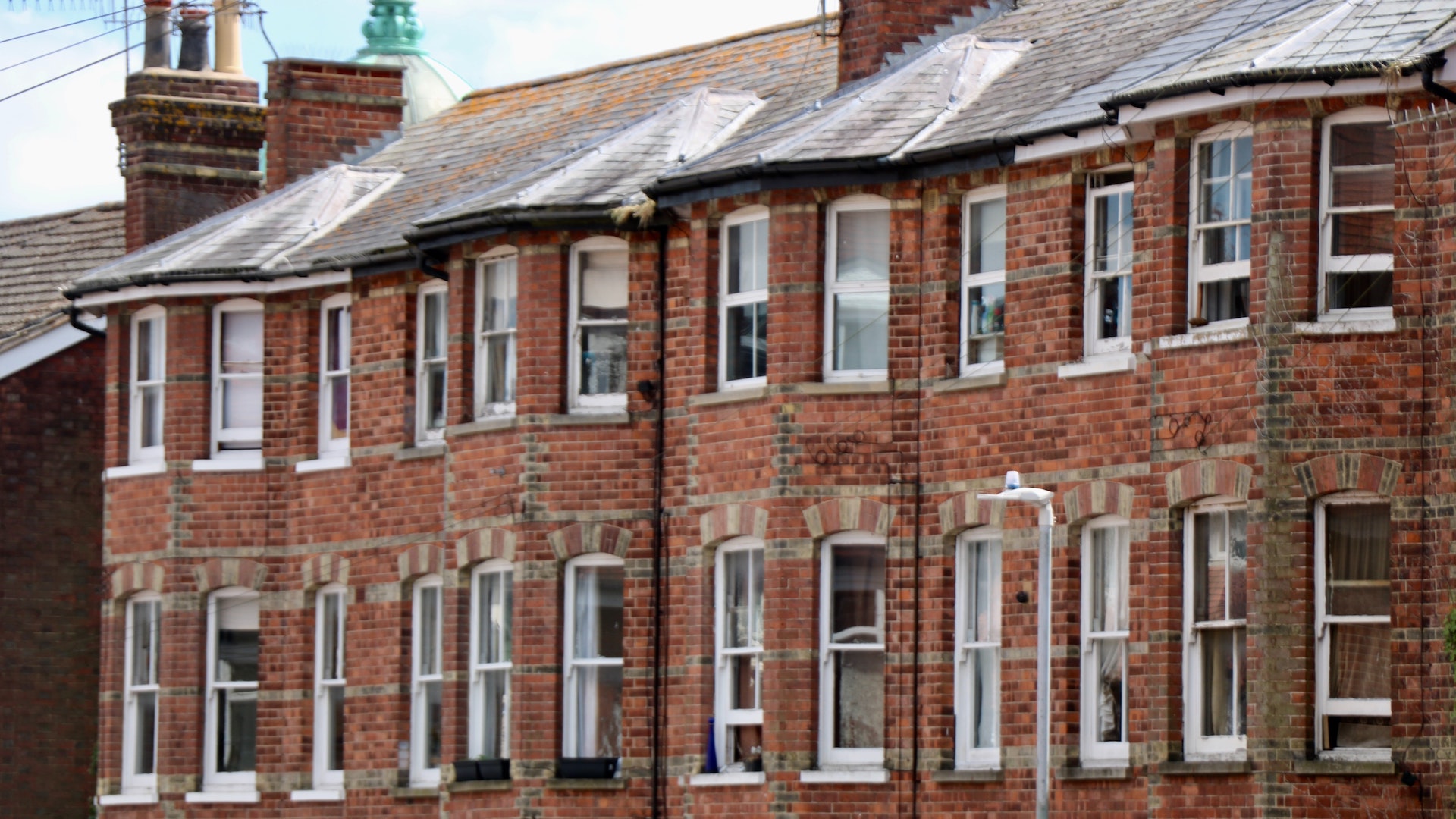 A row of red brick terraced houses