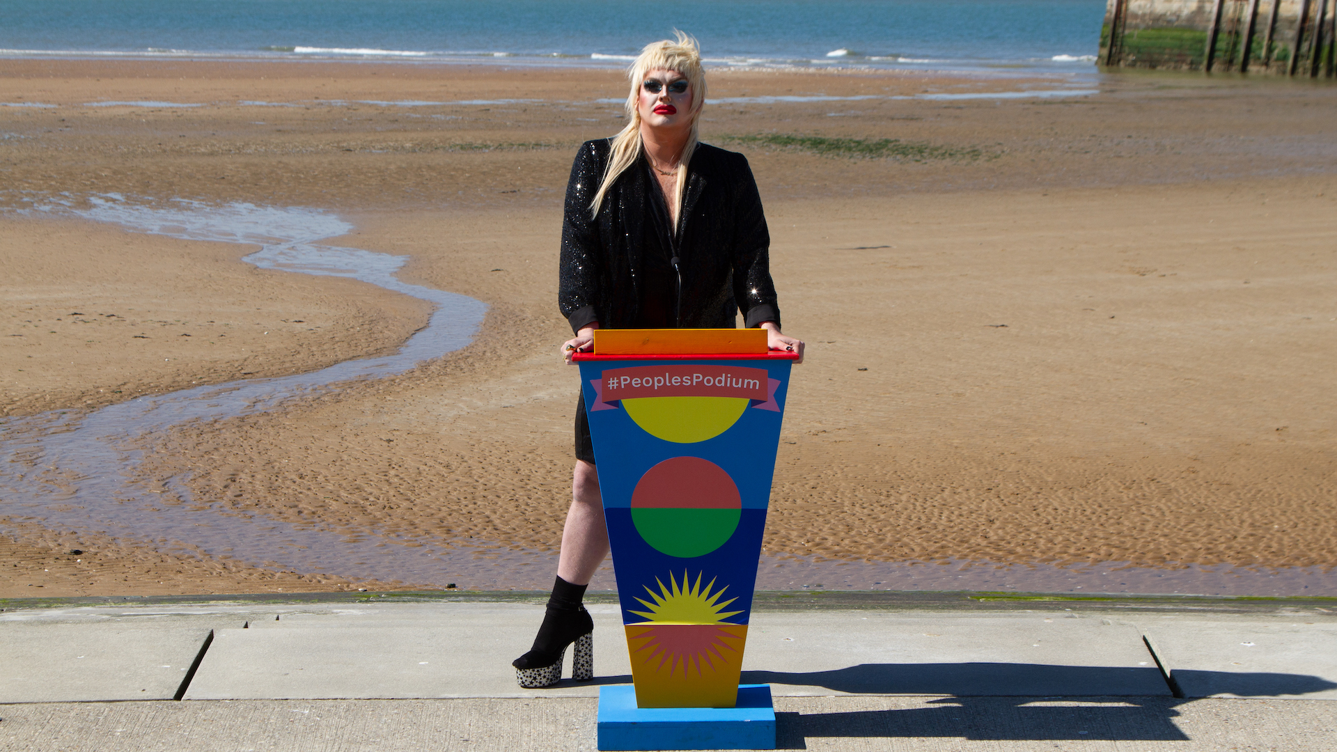 People's podium "As a child, I endured weekly slurs of 'pansy, fairy, mary'." Dame Jame spoke about LGBTQ+ education in Margate.