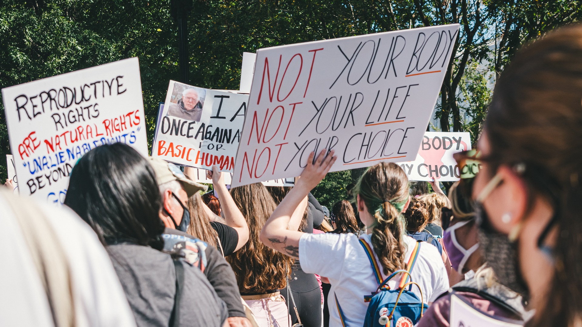 Cost of childcare/ Image of abortion protest