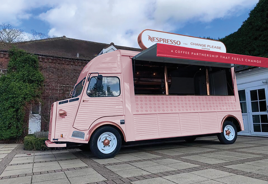 A pink van selling Nespresso for Change Please coffee