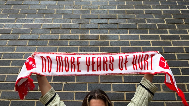 'no more years of hurt' on a scarf - women's aid domestic abuse at the euros campaign imagery