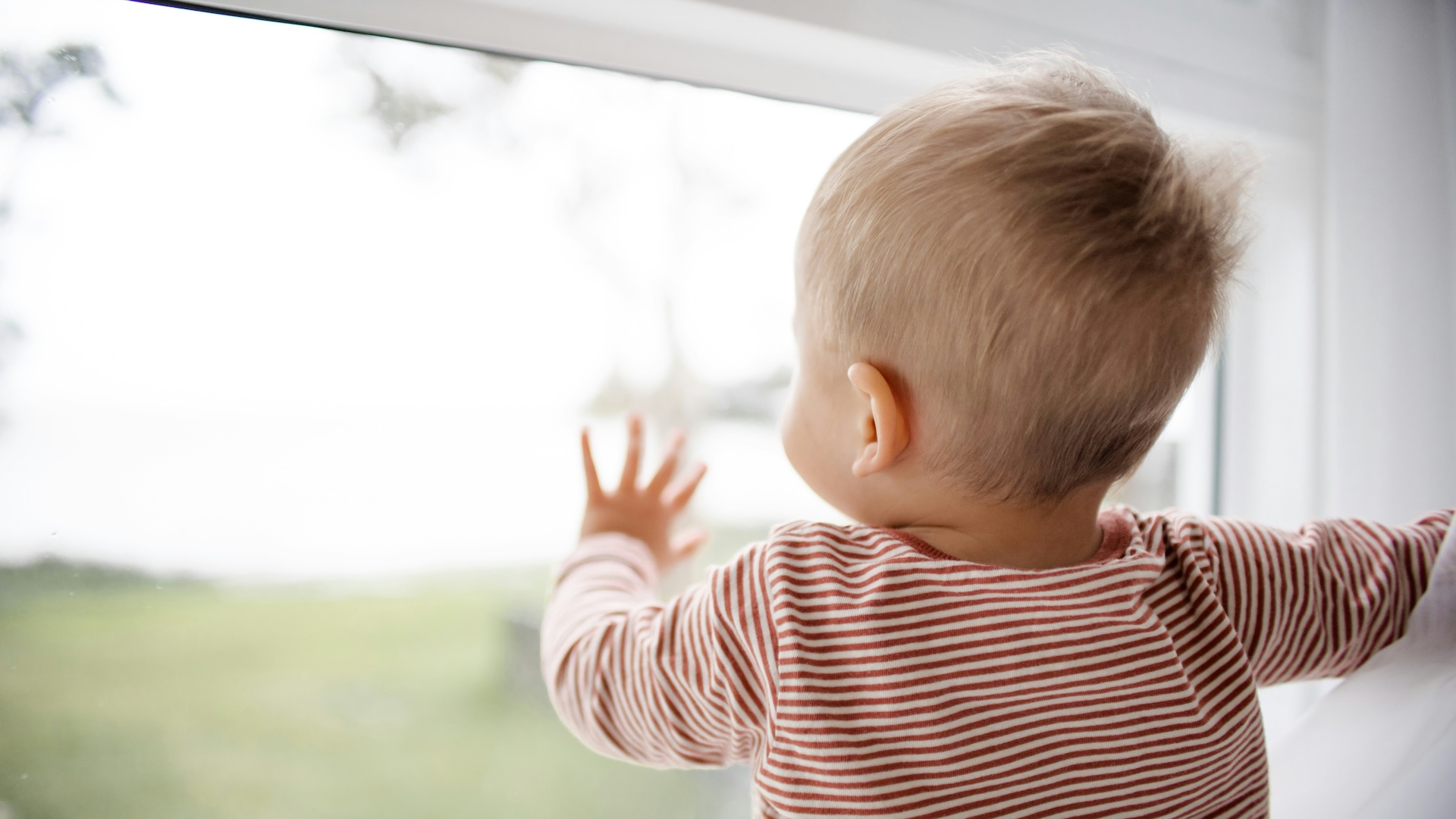 child at window