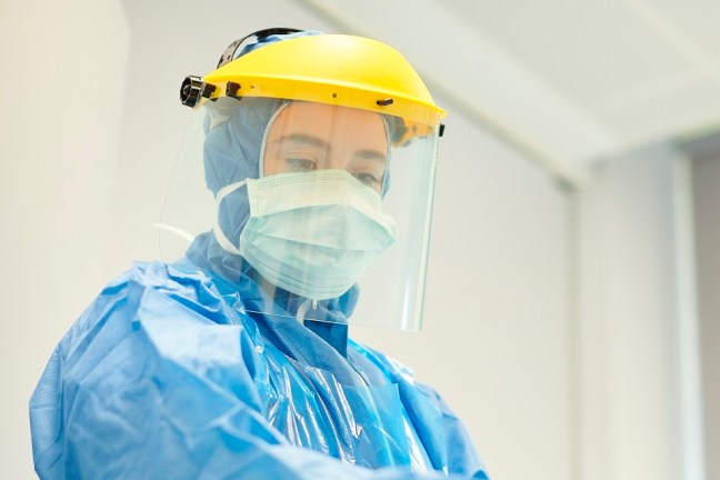 A health worker wearing PPE