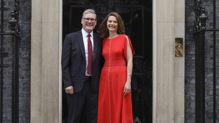 Keir Starmer and his wife Victoria stand on the steps of Number 10 Downing Street
