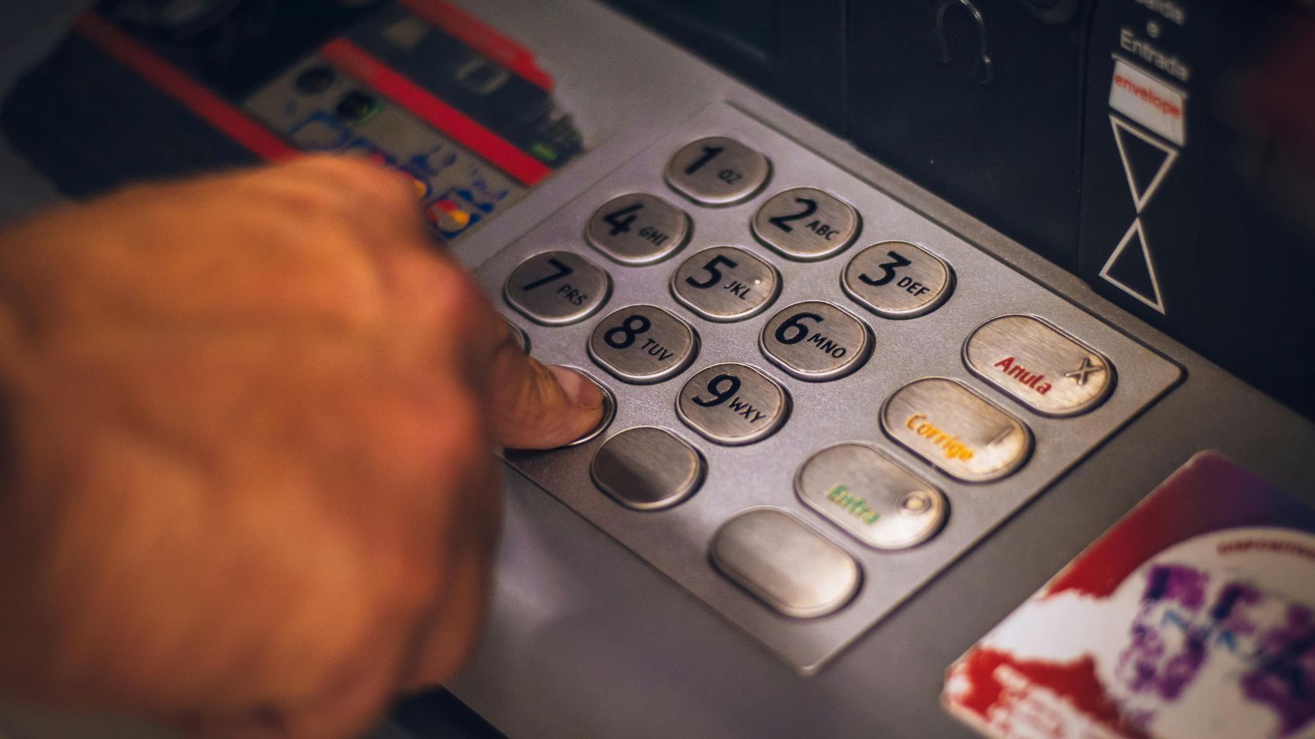 Person using ATM