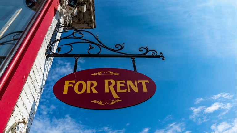 A sign reading 'For Rent'