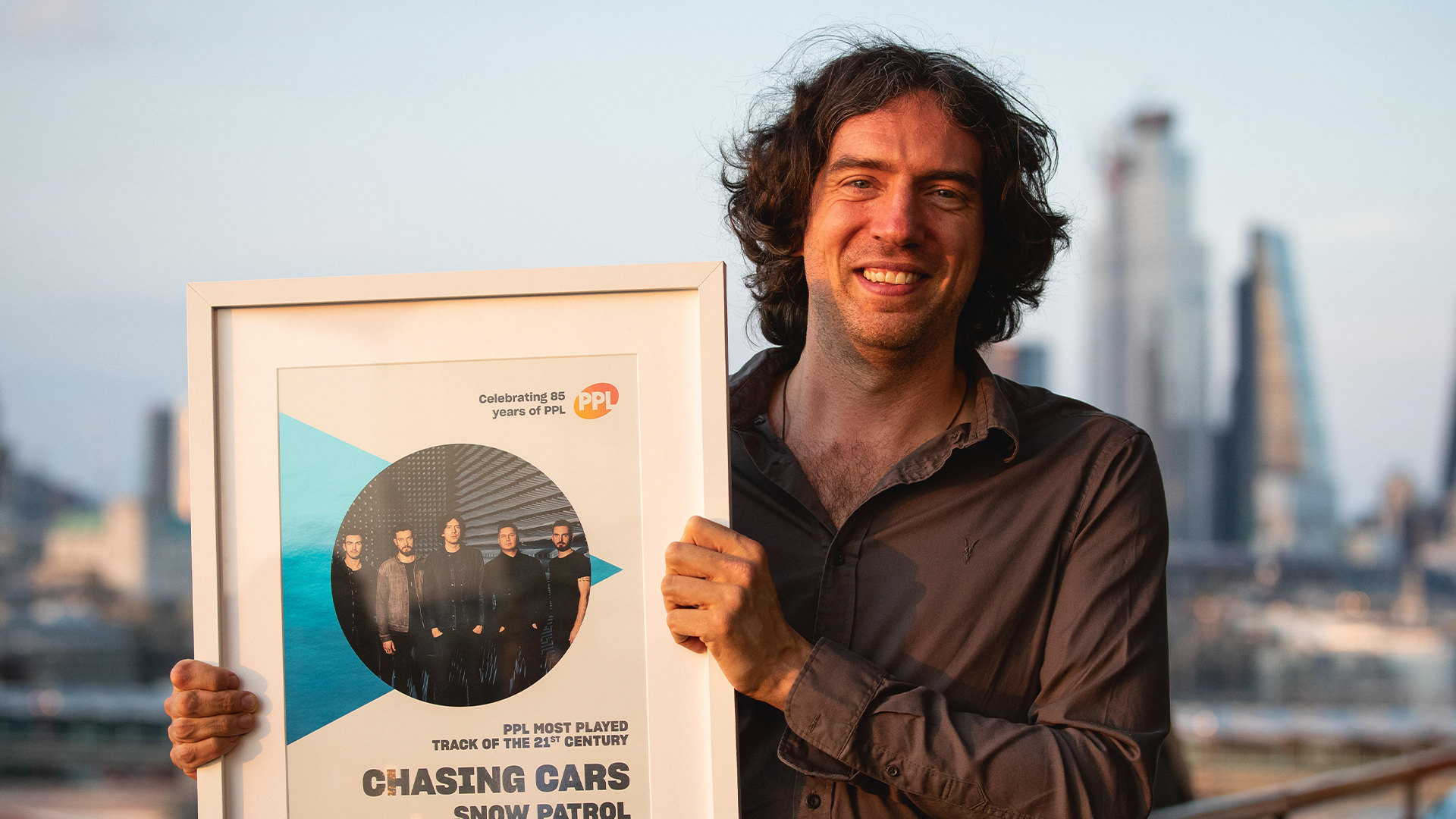 Gary Lightbody Receiving an award in 2019 for Chasing Cars being the most played song of the 21st century on UK radio