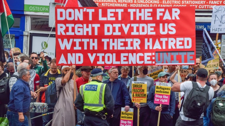 Placards held up at counter protests in London following UK riots