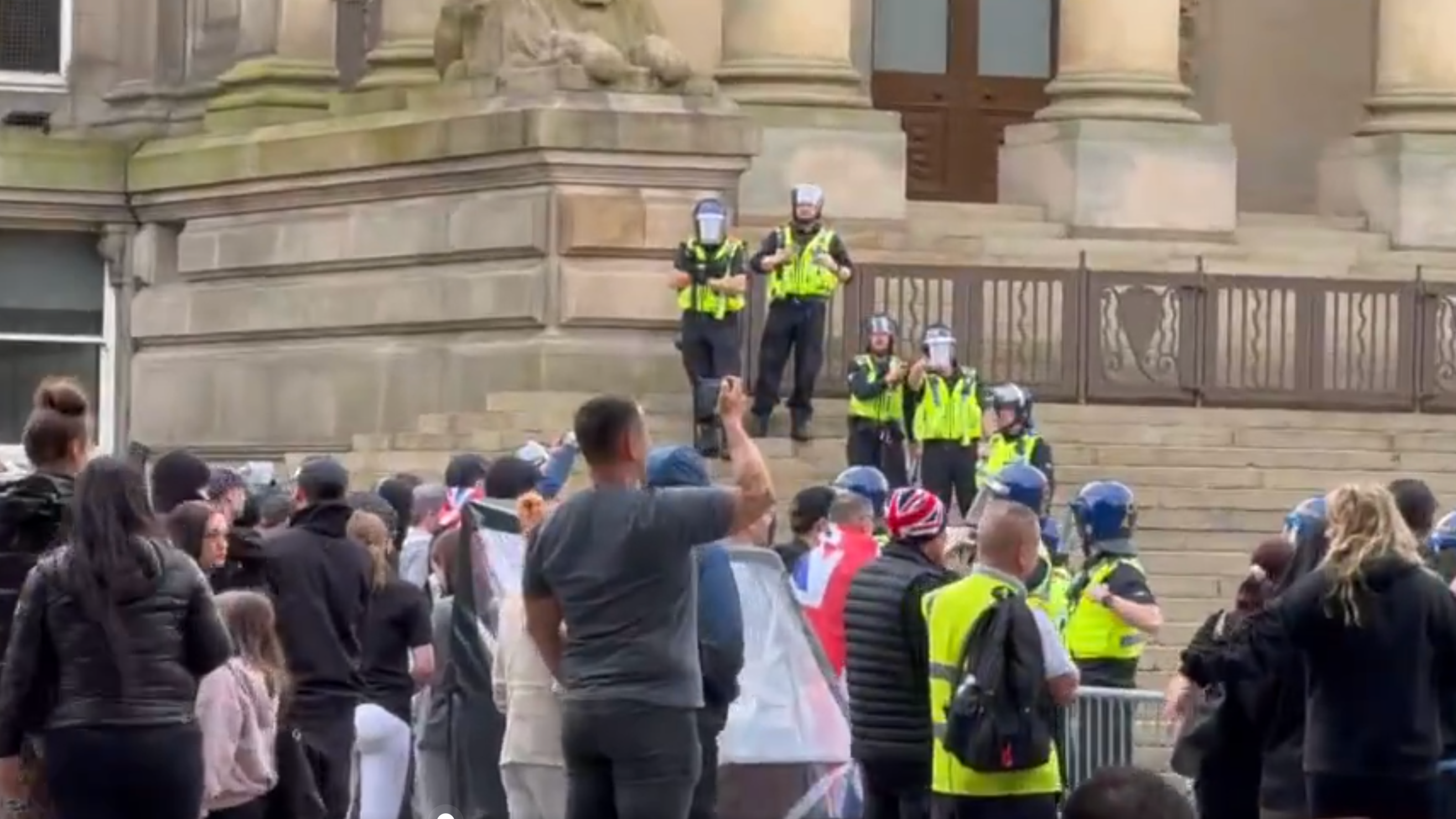 Demonstrators in Victoria square in Bolton