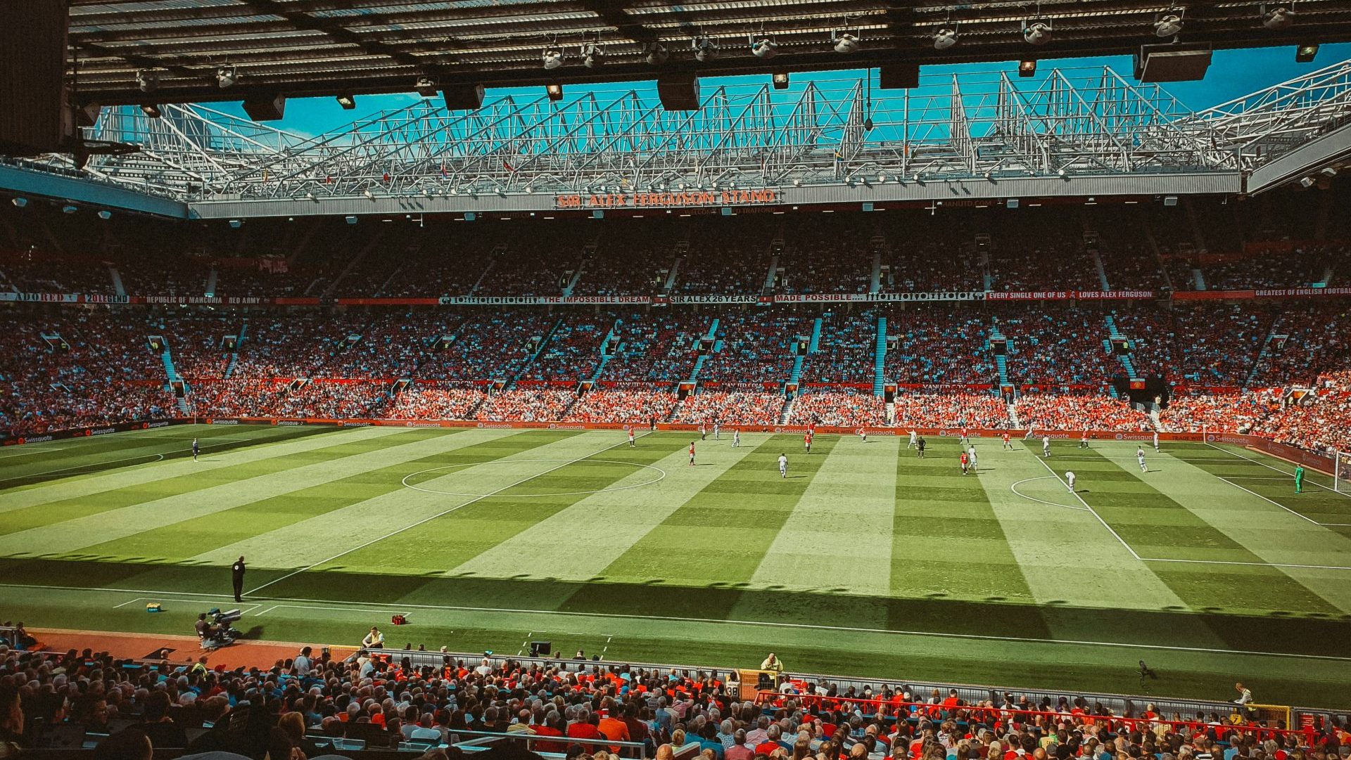 Manchester United playing football at Old Trafford