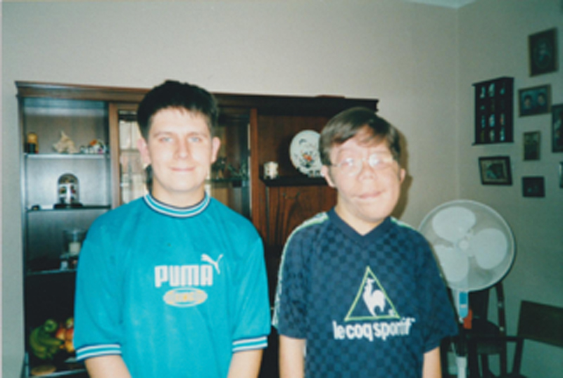 Adam Pearson with twin brother Neil