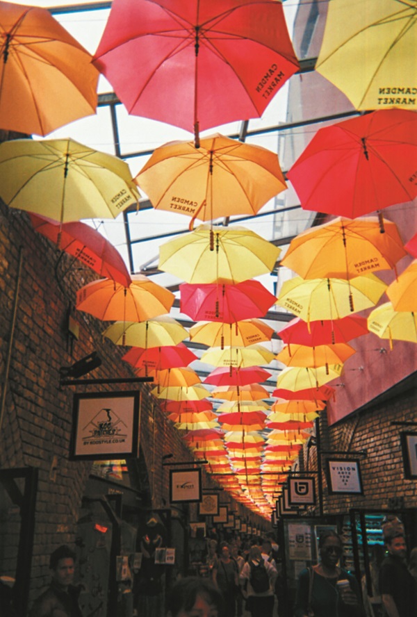 red, orange and yellow umbrellas in Camden, London