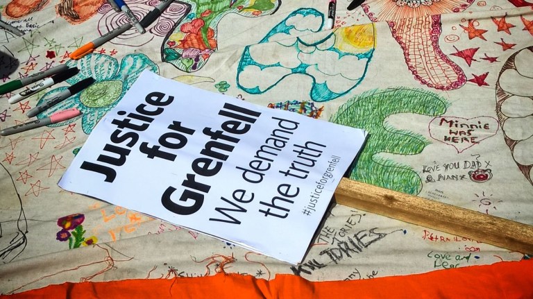 A placard calling for 'Justice for Grenfell'