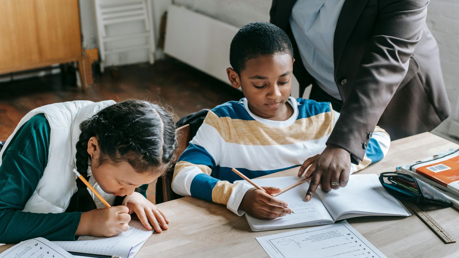 Stock image of children doing work at school