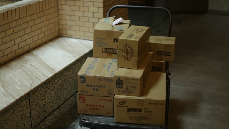 several moving boxes stacked on a palette