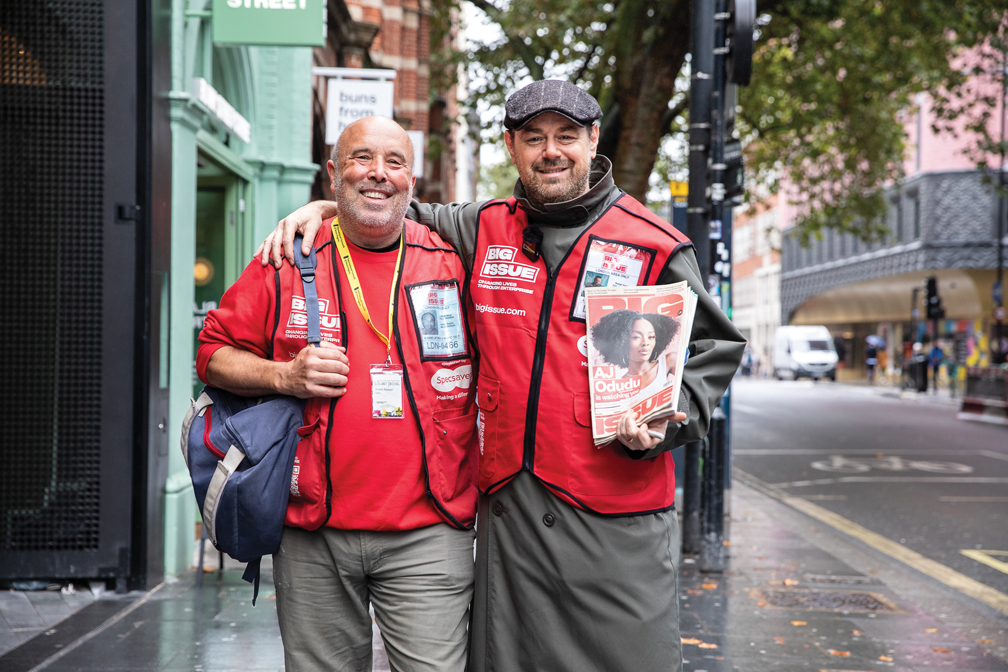 Andre Rostant and Danny Dyer selling The Big Issue on Charing Cross Road