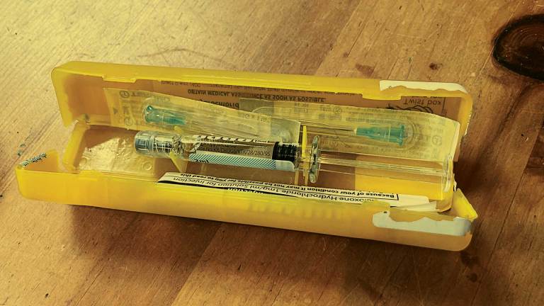 A syringe of naloxone