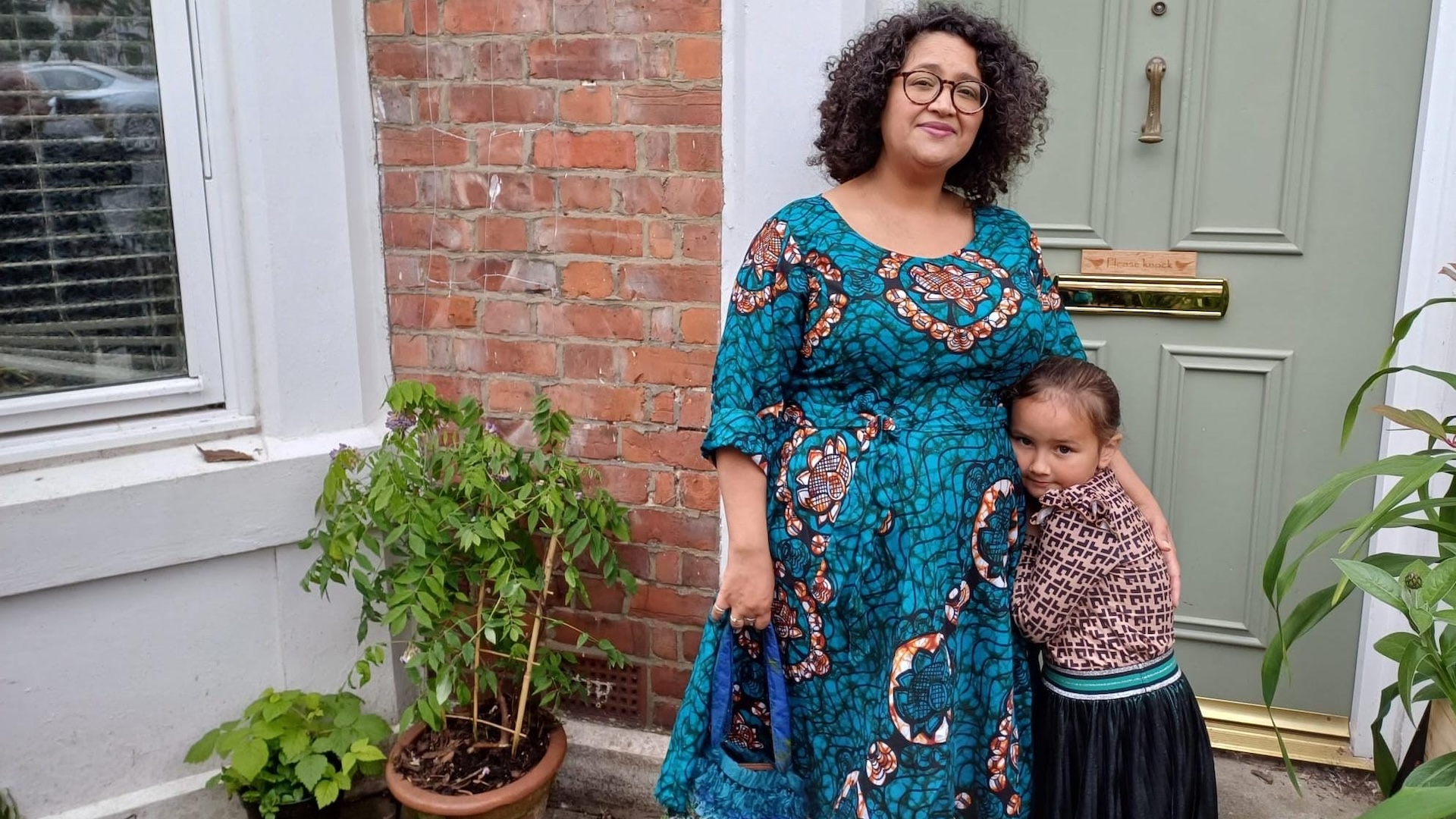 Mwenza Bell and one of her children