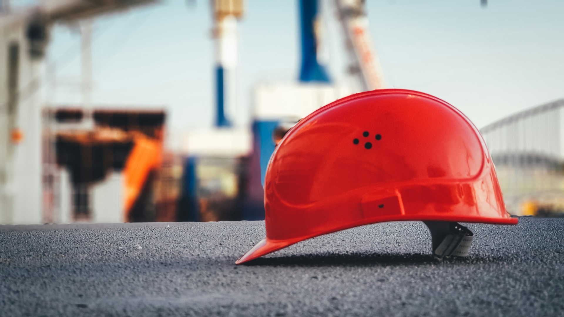 a builder's red hard hat