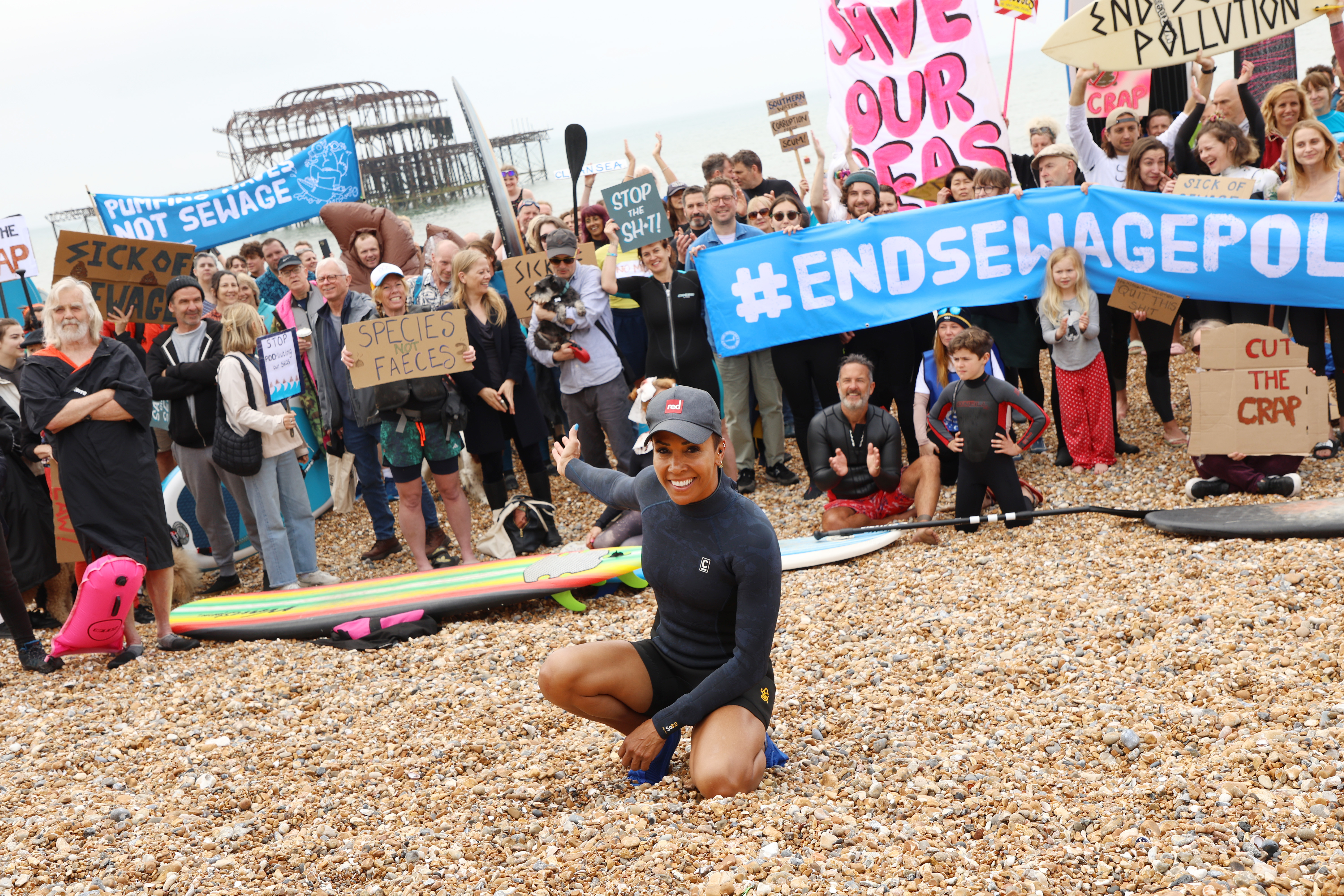 A man on a beach at a Surfers Against Sewage protest