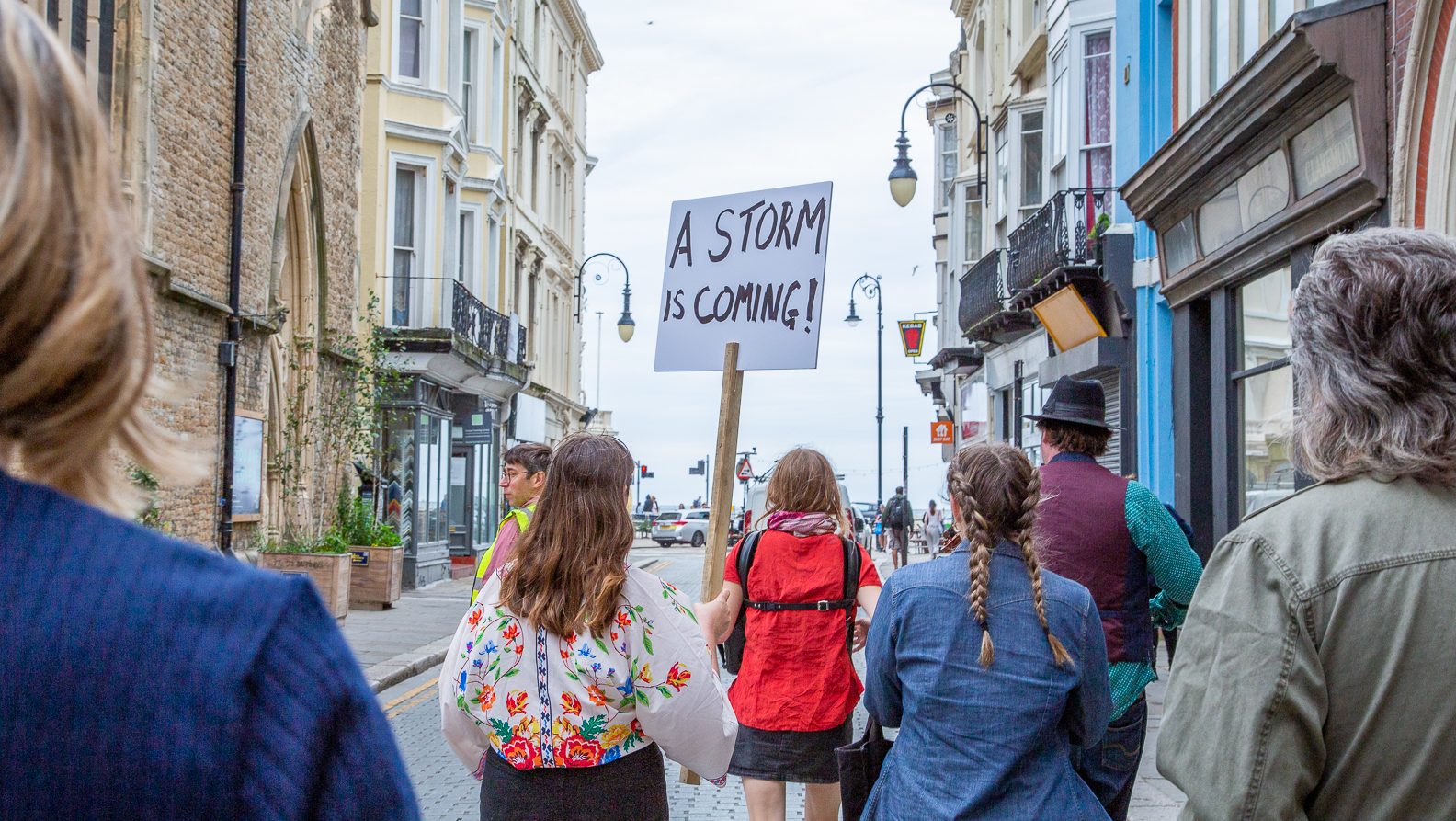 A group of people protest in Hastings