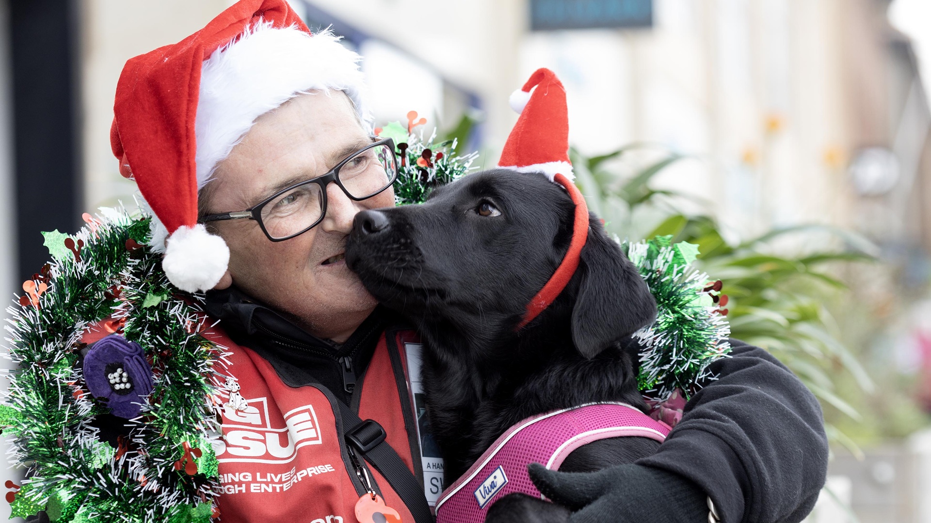 Big Issue vendor Nick Cuthbert and dog Bracken