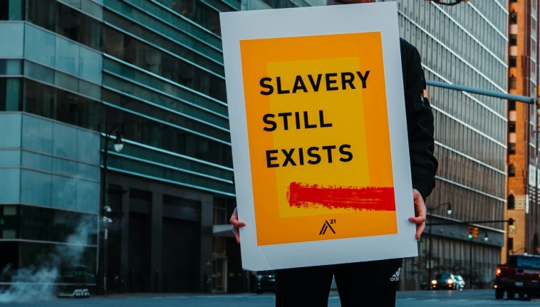 slavery still exists in the modern world poster