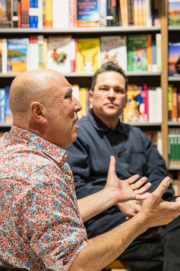 Big Issue vendor André Rostant and Dom Joly in conversation