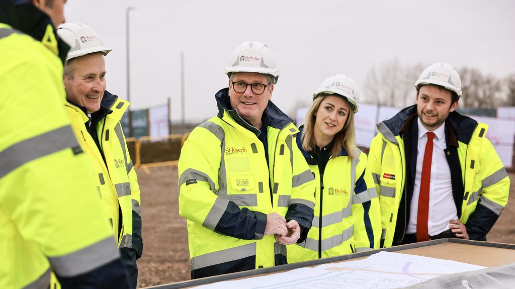 Prime minister Keir Starmer dressed in hi-vis jacket and hard hat