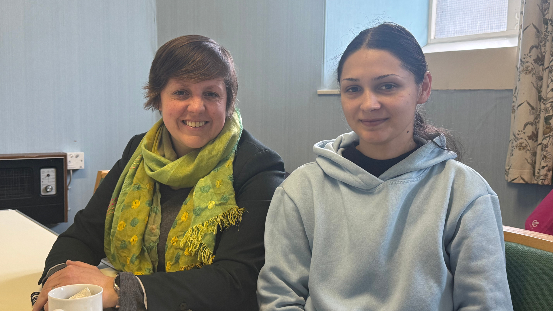 MP Kirsty Blackman and Big Issue vendor Pamela smile during a meeting in Aberdeen.