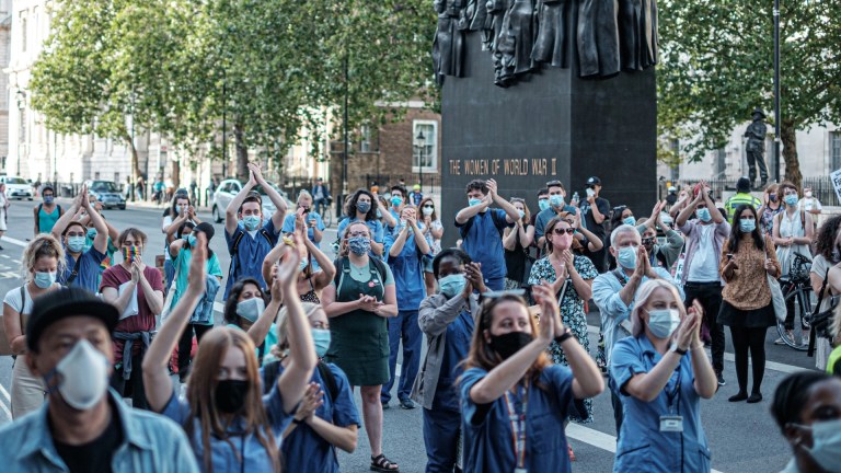 Healthcare workers march through London during the pandemic. Image: Unsplash